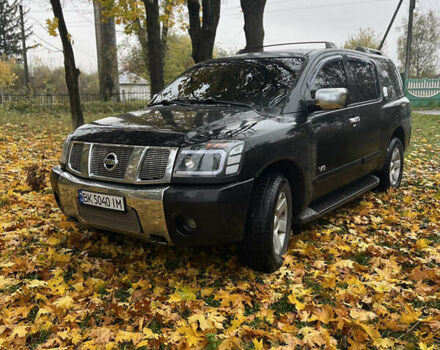 Черный Ниссан Армада, объемом двигателя 5.6 л и пробегом 256 тыс. км за 9200 $, фото 1 на Automoto.ua