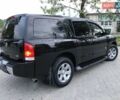 Черный Ниссан Армада, объемом двигателя 5.6 л и пробегом 200 тыс. км за 8400 $, фото 4 на Automoto.ua