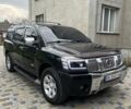 Черный Ниссан Армада, объемом двигателя 5.6 л и пробегом 255 тыс. км за 9000 $, фото 1 на Automoto.ua