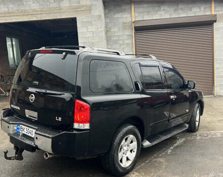 Черный Ниссан Армада, объемом двигателя 5.6 л и пробегом 256 тыс. км за 9200 $, фото 3 на Automoto.ua