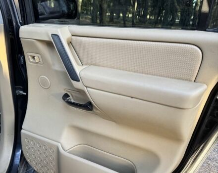 Черный Ниссан Армада, объемом двигателя 5.6 л и пробегом 264 тыс. км за 10500 $, фото 9 на Automoto.ua