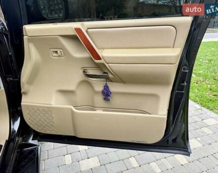 Черный Ниссан Армада, объемом двигателя 5.6 л и пробегом 267 тыс. км за 10999 $, фото 48 на Automoto.ua