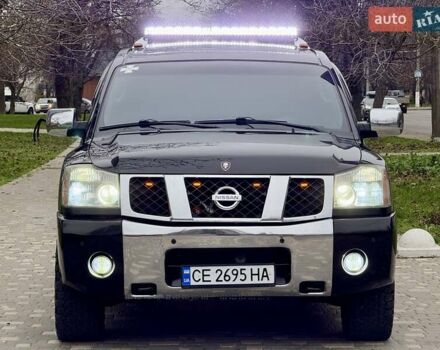 Черный Ниссан Армада, объемом двигателя 5.6 л и пробегом 267 тыс. км за 10999 $, фото 1 на Automoto.ua