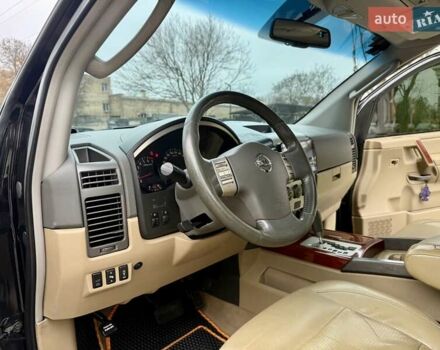 Черный Ниссан Армада, объемом двигателя 5.6 л и пробегом 267 тыс. км за 10999 $, фото 38 на Automoto.ua