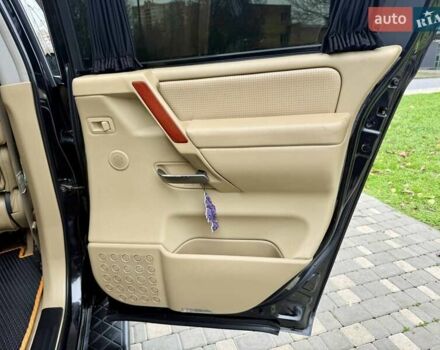 Черный Ниссан Армада, объемом двигателя 5.6 л и пробегом 267 тыс. км за 10999 $, фото 64 на Automoto.ua