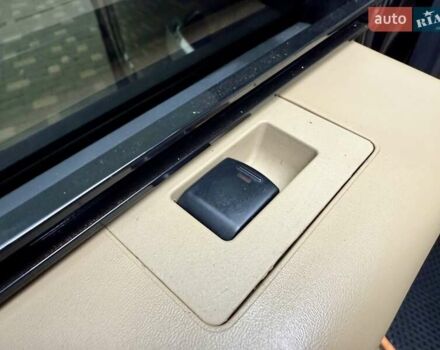 Черный Ниссан Армада, объемом двигателя 5.6 л и пробегом 267 тыс. км за 10999 $, фото 63 на Automoto.ua