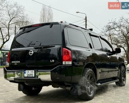 Черный Ниссан Армада, объемом двигателя 5.6 л и пробегом 267 тыс. км за 10999 $, фото 9 на Automoto.ua