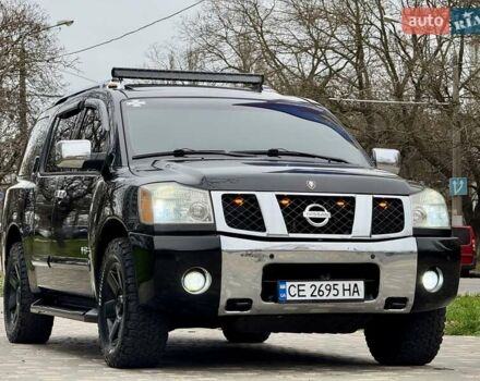 Черный Ниссан Армада, объемом двигателя 5.6 л и пробегом 267 тыс. км за 10999 $, фото 3 на Automoto.ua