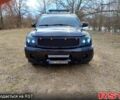 Черный Ниссан Армада, объемом двигателя 5.6 л и пробегом 255 тыс. км за 8000 $, фото 1 на Automoto.ua