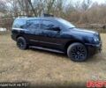 Черный Ниссан Армада, объемом двигателя 5.6 л и пробегом 255 тыс. км за 8000 $, фото 2 на Automoto.ua