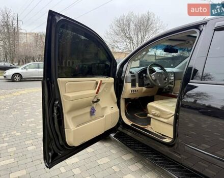 Черный Ниссан Армада, объемом двигателя 5.6 л и пробегом 267 тыс. км за 10999 $, фото 33 на Automoto.ua