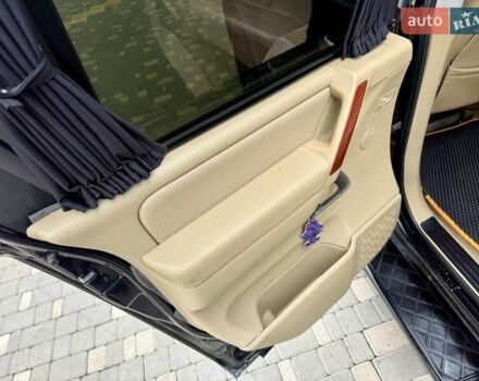 Черный Ниссан Армада, объемом двигателя 5.6 л и пробегом 267 тыс. км за 10999 $, фото 58 на Automoto.ua