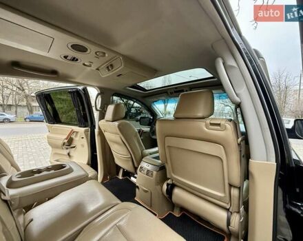 Черный Ниссан Армада, объемом двигателя 5.6 л и пробегом 267 тыс. км за 10999 $, фото 71 на Automoto.ua