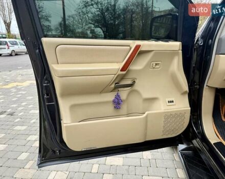 Черный Ниссан Армада, объемом двигателя 5.6 л и пробегом 267 тыс. км за 10999 $, фото 32 на Automoto.ua