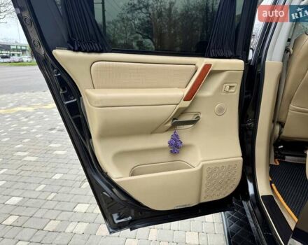 Черный Ниссан Армада, объемом двигателя 5.6 л и пробегом 267 тыс. км за 10999 $, фото 59 на Automoto.ua