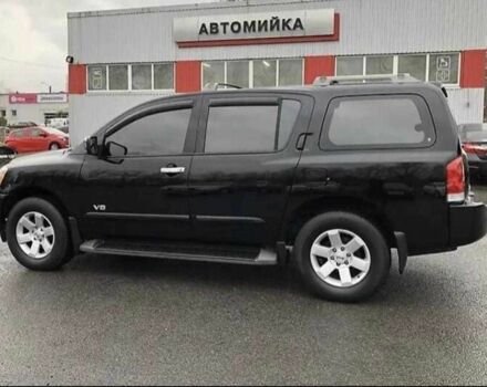 Черный Ниссан Армада, объемом двигателя 5.6 л и пробегом 330 тыс. км за 13700 $, фото 3 на Automoto.ua