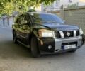 Черный Ниссан Армада, объемом двигателя 5.6 л и пробегом 230 тыс. км за 11500 $, фото 2 на Automoto.ua