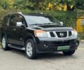 Черный Ниссан Армада, объемом двигателя 5.5 л и пробегом 180 тыс. км за 10900 $, фото 1 на Automoto.ua