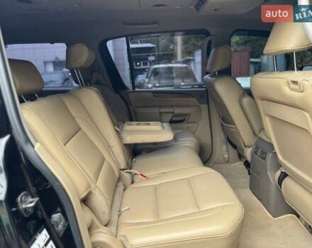Черный Ниссан Армада, объемом двигателя 5.55 л и пробегом 180 тыс. км за 10900 $, фото 19 на Automoto.ua