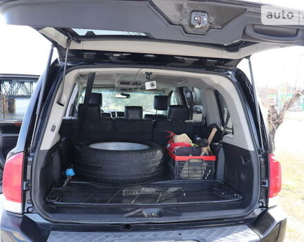 Черный Ниссан Армада, объемом двигателя 5.56 л и пробегом 191 тыс. км за 14999 $, фото 10 на Automoto.ua