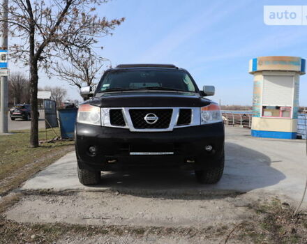 Черный Ниссан Армада, объемом двигателя 5.56 л и пробегом 191 тыс. км за 14999 $, фото 1 на Automoto.ua