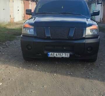 Чорний Ніссан Armada, об'ємом двигуна 5.6 л та пробігом 300 тис. км за 8500 $, фото 1 на Automoto.ua