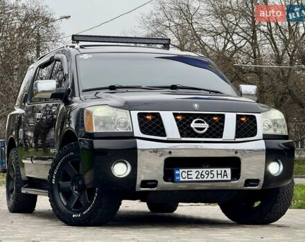 Черный Ниссан Армада, объемом двигателя 5.6 л и пробегом 267 тыс. км за 10999 $, фото 1 на Automoto.ua