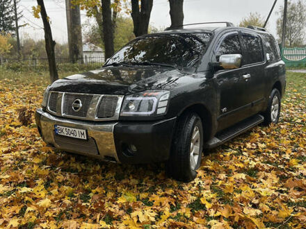 Чорний Ніссан Armada, об'ємом двигуна 5.6 л та пробігом 256 тис. км за 9200 $, фото 1 на Automoto.ua