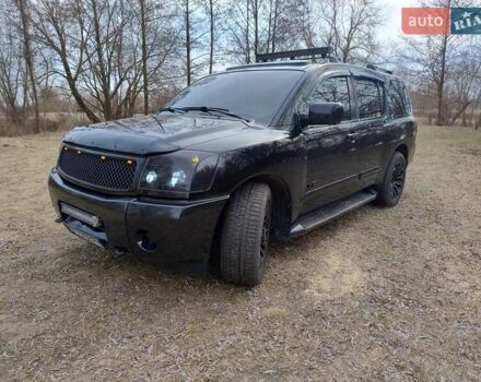 Чорний Ніссан Armada, об'ємом двигуна 5.6 л та пробігом 255 тис. км за 8000 $, фото 1 на Automoto.ua