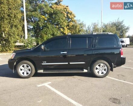 Чорний Ніссан Armada, об'ємом двигуна 5.55 л та пробігом 350 тис. км за 11500 $, фото 1 на Automoto.ua