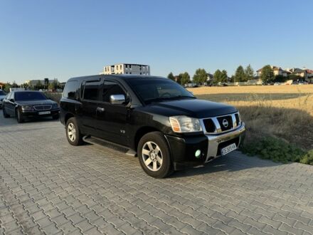 Черный Ниссан Армада, объемом двигателя 5.6 л и пробегом 230 тыс. км за 12500 $, фото 1 на Automoto.ua
