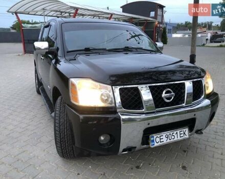 Чорний Ніссан Armada, об'ємом двигуна 5.6 л та пробігом 200 тис. км за 8400 $, фото 1 на Automoto.ua