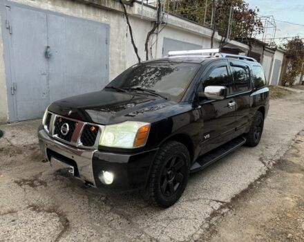 Черный Ниссан Армада, объемом двигателя 5.6 л и пробегом 240 тыс. км за 13000 $, фото 1 на Automoto.ua