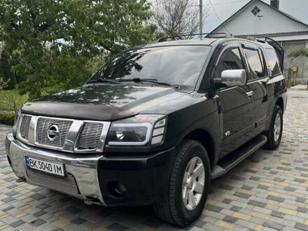 Ніссан Armada 2006 у Рівному на Automoto.ua Чорний Ніссан Armada, об'ємом двигуна 5.6 л та пробігом 244 тис. км за 10999 $, фото 1 на Automoto.ua