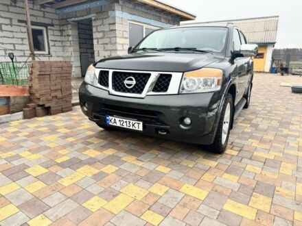 Черный Ниссан Армада, объемом двигателя 5.6 л и пробегом 150 тыс. км за 12800 $, фото 1 на Automoto.ua