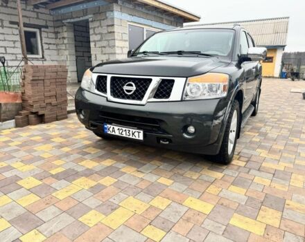 Черный Ниссан Армада, объемом двигателя 5.6 л и пробегом 150 тыс. км за 12800 $, фото 1 на Automoto.ua
