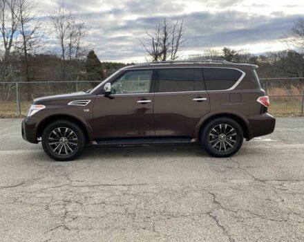 Коричневый Ниссан Армада, объемом двигателя 5.6 л и пробегом 49 тыс. км за 13200 $, фото 3 на Automoto.ua