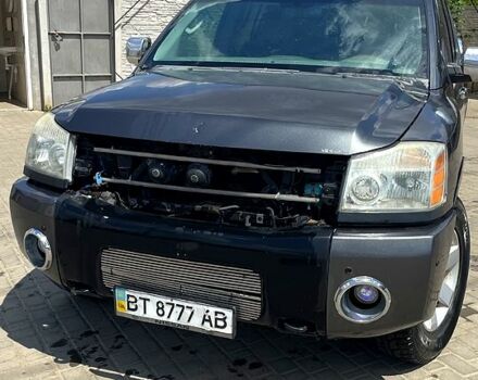 Сірий Ніссан Armada, об'ємом двигуна 5.6 л та пробігом 312 тис. км за 5600 $, фото 1 на Automoto.ua