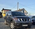 Серый Ниссан Армада, объемом двигателя 5.55 л и пробегом 135 тыс. км за 18450 $, фото 1 на Automoto.ua
