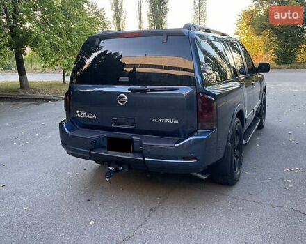 Синій Ніссан Armada, об'ємом двигуна 5.55 л та пробігом 126 тис. км за 15000 $, фото 4 на Automoto.ua