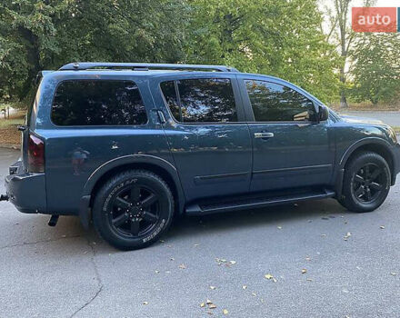 Синій Ніссан Armada, об'ємом двигуна 5.55 л та пробігом 126 тис. км за 15000 $, фото 2 на Automoto.ua