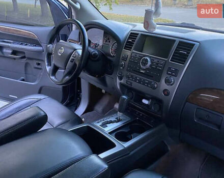 Синій Ніссан Armada, об'ємом двигуна 5.55 л та пробігом 126 тис. км за 15000 $, фото 7 на Automoto.ua