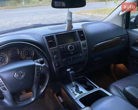 Синій Ніссан Armada, об'ємом двигуна 5.55 л та пробігом 126 тис. км за 15000 $, фото 9 на Automoto.ua