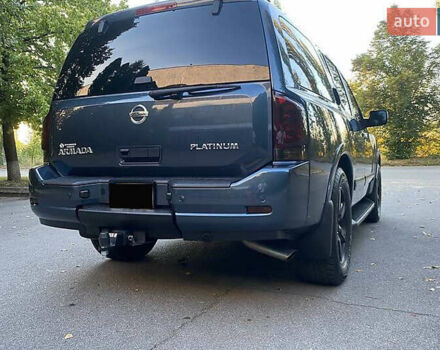 Синій Ніссан Armada, об'ємом двигуна 5.55 л та пробігом 126 тис. км за 15000 $, фото 3 на Automoto.ua