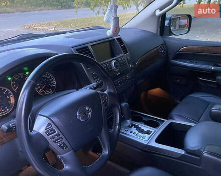 Синій Ніссан Armada, об'ємом двигуна 5.55 л та пробігом 126 тис. км за 15000 $, фото 6 на Automoto.ua