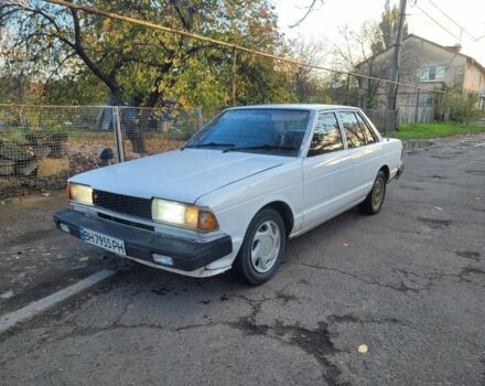 Белый Ниссан Блюберд, объемом двигателя 2 л и пробегом 300 тыс. км за 650 $, фото 2 на Automoto.ua