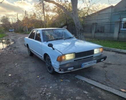 Белый Ниссан Блюберд, объемом двигателя 2 л и пробегом 300 тыс. км за 650 $, фото 3 на Automoto.ua