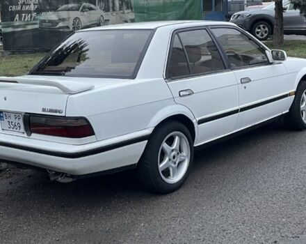 Белый Ниссан Блюберд, объемом двигателя 1.6 л и пробегом 320 тыс. км за 600 $, фото 3 на Automoto.ua