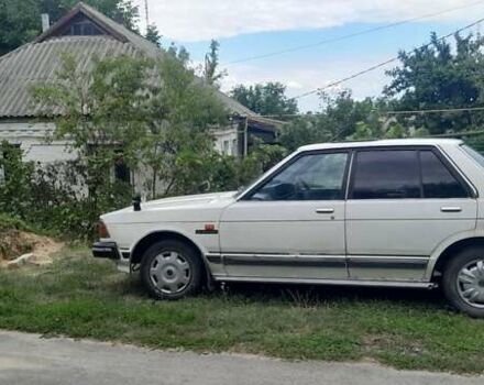 Білий Ніссан Блюберд, об'ємом двигуна 1.8 л та пробігом 198 тис. км за 700 $, фото 10 на Automoto.ua