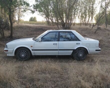 Белый Ниссан Блюберд, объемом двигателя 2 л и пробегом 387 тыс. км за 1200 $, фото 2 на Automoto.ua